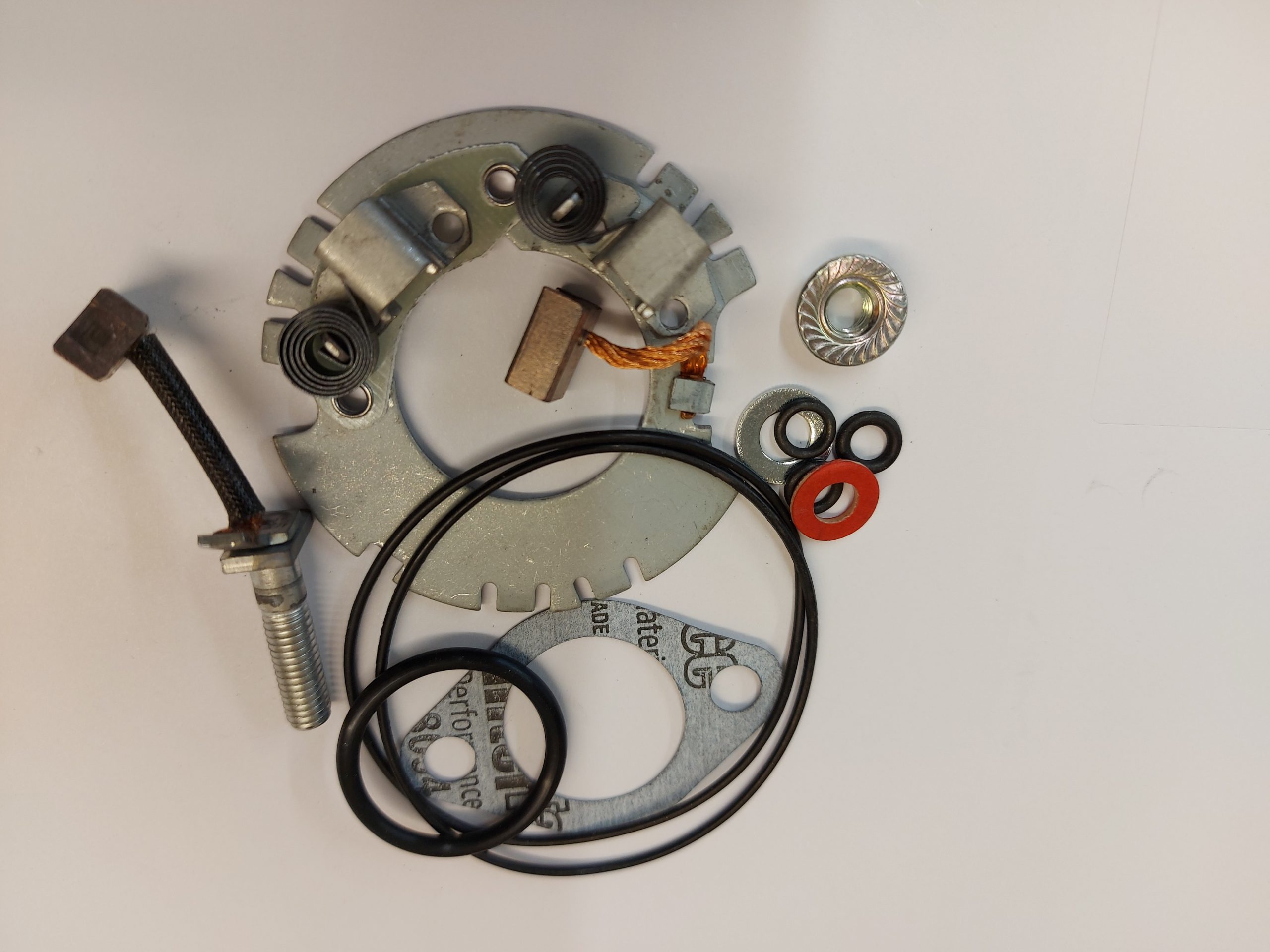 Starter motor brush and back plate set. Taigene