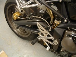 Rider Footrests with rubbers (pair) for extra grip available for 675, 955 Daytona, 1050 Tiger and Tiger Sport 660.